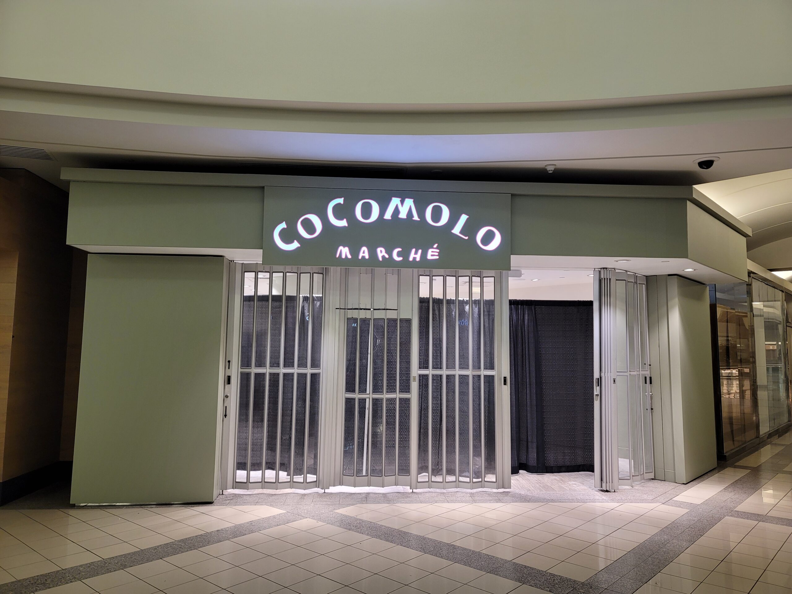 Completed Cocomolo storefront and illuminated sign at Metrotown