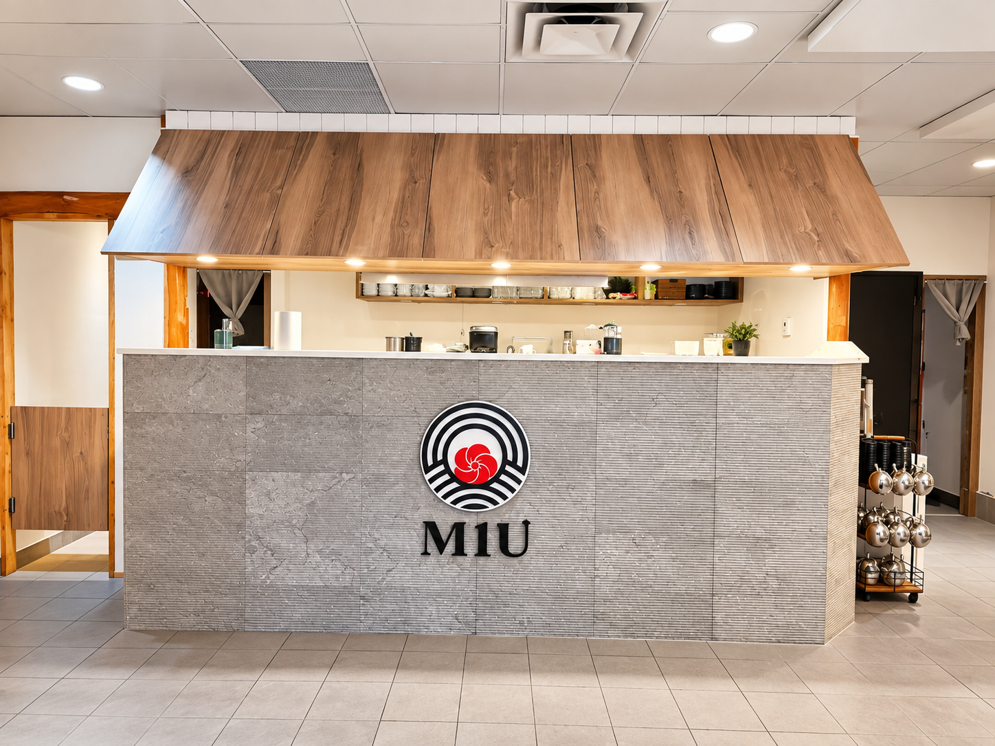 Miu Sushi bar with wood canopy and textured counter front